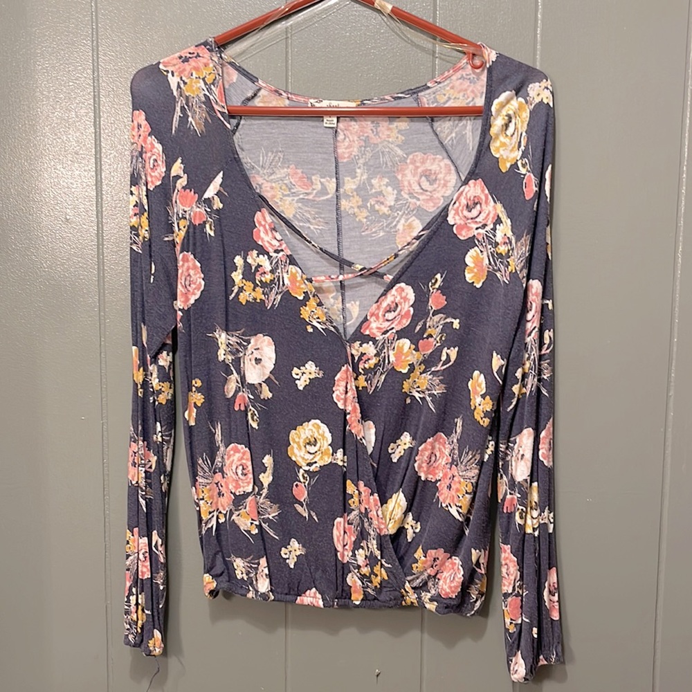 Women’s crossover neck light weight shirt. Great over a cute cami.